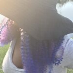 Black woman with hat on. Black woman with floppy hat on