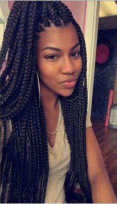 Jumbo braids in a ponytail
