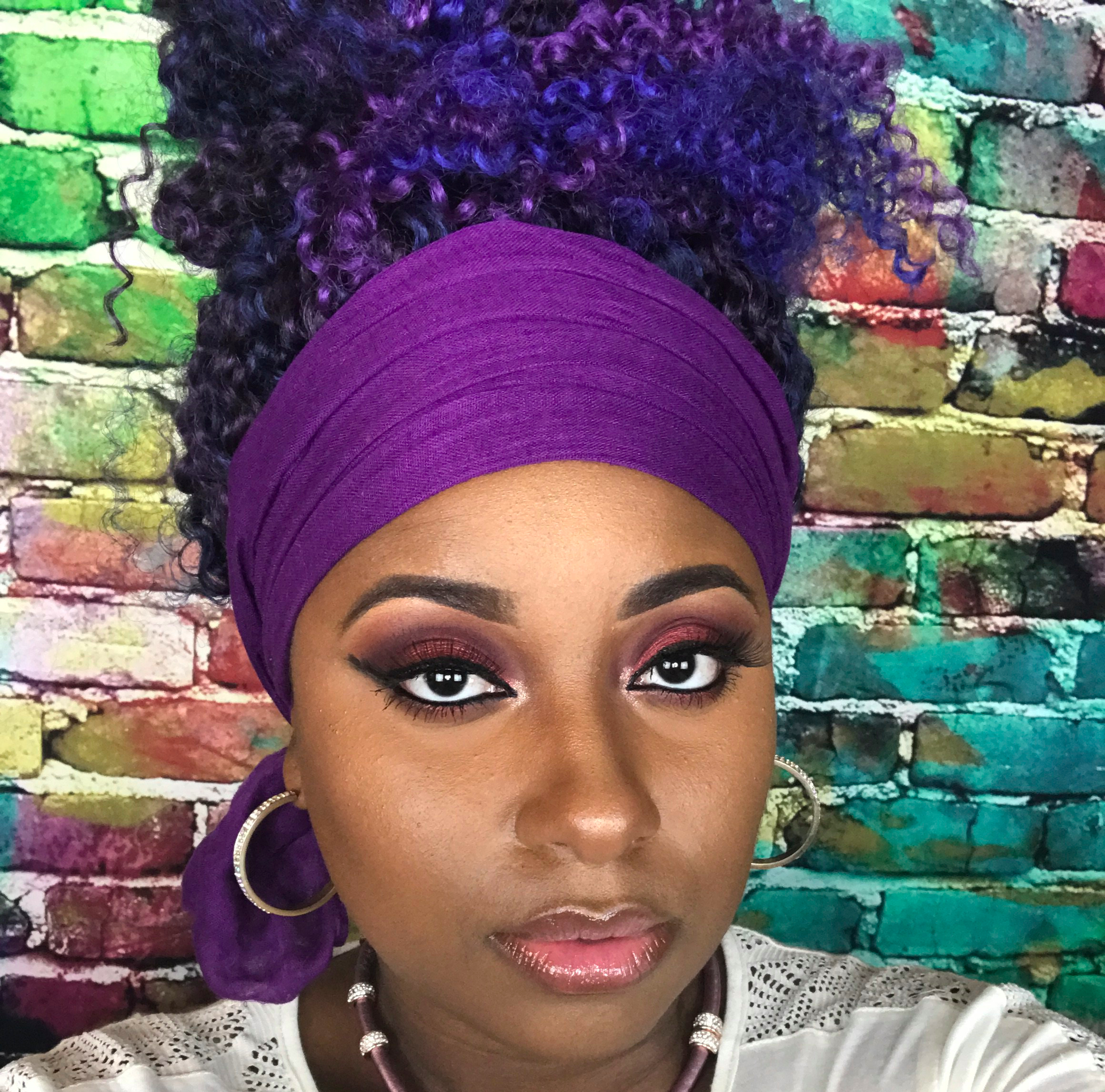 Qualah with red fall makeup. Queen of Hearts Palette look on brown skin