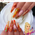 Long coffin Orange foil and glitter nail design