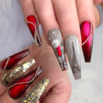Gray and red eifle tower nail design