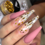 Pink and gold nail design