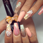 Peach chrome and gold glitter 3d nail design