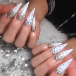 Long stiletto white nails with rhine stones