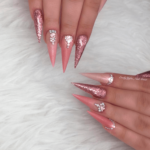 Mauve pink glitter nails stiletto